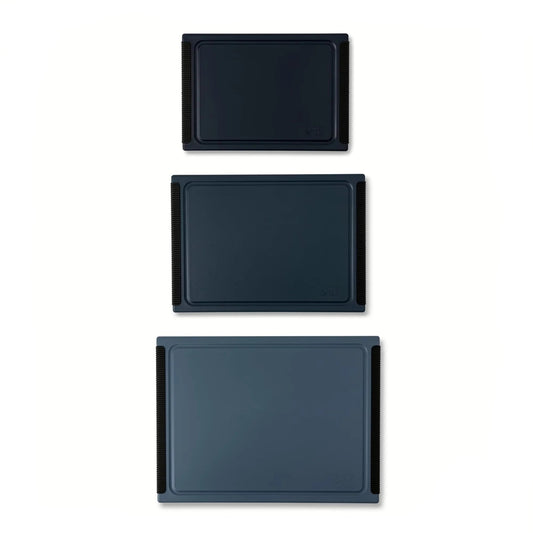 three cutting boards, in shades of dark blue/gray